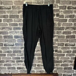 COS jogger pants black pockets light weight